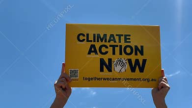 Climate action now protest sign