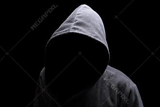Hooded man in the shadow