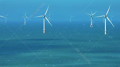 Aerial view of Offshore Windmill farm in the ocean