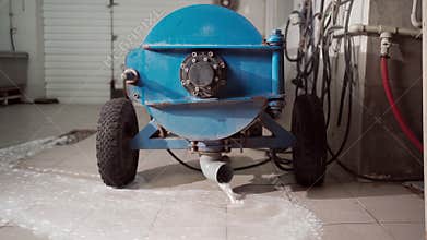 carpet in automatic washing machine and pouring water. Laundry service