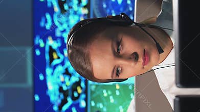 Workplace of the air traffic controllers in the control tower. Team of professional aircraft control officers works