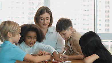 Student and teacher drawing and colouring by using marker or crayon. Erudition.