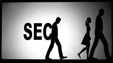 Silhouetted figures walking past the word secrets, concept of holding secrets in personal lives