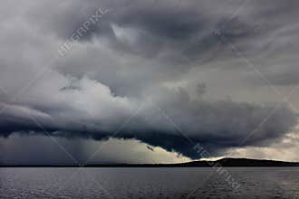 The cloudy sky above the waters of the Baskatong Reservoir