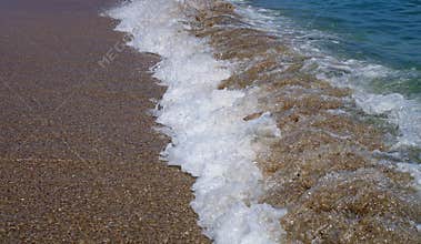 Summer, sea, sun, beach, holiday, fun. Foamy waves on the seashore - Black Sea, landmark attraction in Romania
