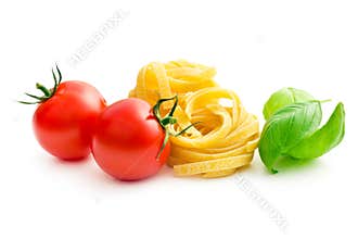 Italian pasta tagliatelle, tomatoes and basil leaves