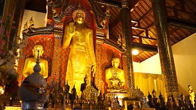 Big standing buddha image slider wide shot