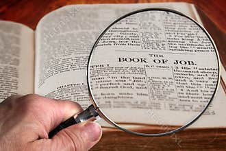 Magnifying Glass on Famous Bible Chapter of Job