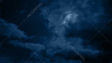 Clouds move over the moon