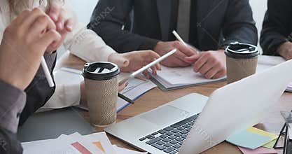 Business people using digital tablet and document at office meeting