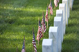 Flags of Memorial Day before tombstones at Arlington National Cemetery
