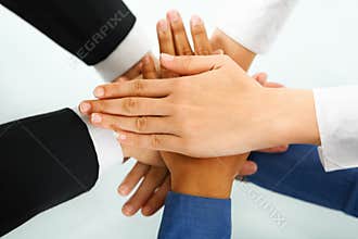 Leader and his employees hands in unity