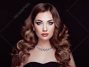 Brunette woman with long shiny wavy hair