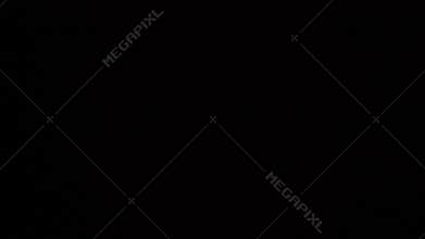 A silhouette appears and disappears in a dark, fearful corridor