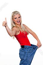 Young Woman Indicating Weight Loss Success