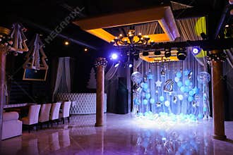 Decorated amazing scene for birthday party with blue balloons and number 4.