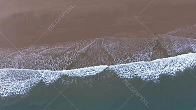 Breaking waves on a beach