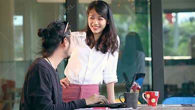 Younger asian freelance working in home office