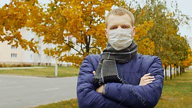 Sick or healthy man wearing surgical procedure mask due to Influenza flu virus