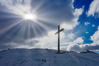 Christian Cross silhouette sunlight clouds sky