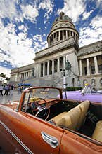 Car in front of Capitol in Havana.