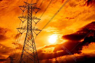 High voltage electric pole and transmission lines. Electricity pylons at sunset. Power and energy. Energy conservation. High