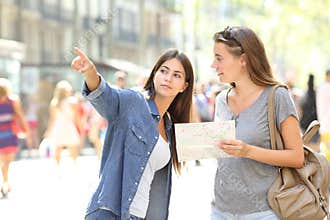 Lost tourist asking for help from a pedestrian