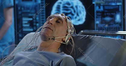 Patient lying in bed during EEG examination