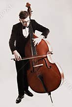 Double bass player playing contrabass