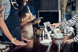 customer self service order drink menu with tablet screen at cafe counter bar,seller coffee shop accept payment by