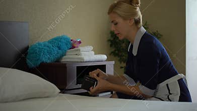 Dishonest maid steals money from hotel residents purse, lack of tips, crime