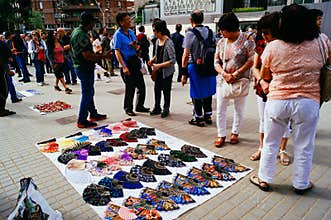 Tourists buying souvenirs in Barcelona