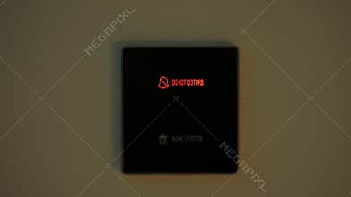 do not disturb. close-up. the sign is lit in red. electronic plate. a digital board with an inscription - do not disturb