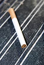 Cigarette on table