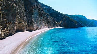 Paradise beach, chomi, Corfu in Greece. Drone shot of a turquoise coloured sea.