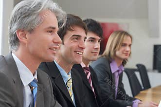 Four men at a seminar