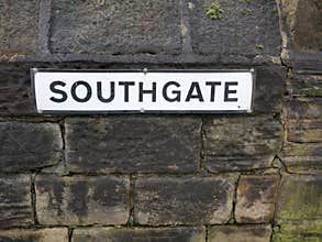 Southgate road sign on stone wall