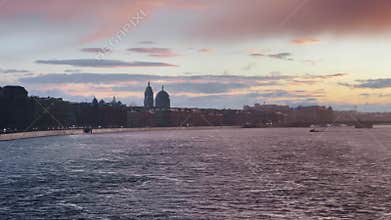 The Russian Venice, rainy footage of embankment of Saint Petersburg, Russia at sunset, the river Neva, cityscape in dusk