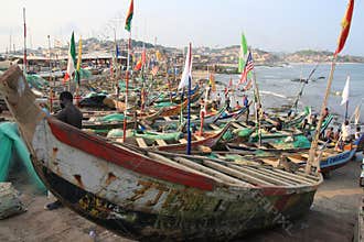 Siesta of fishermen in Cape Coast harbour, Africa