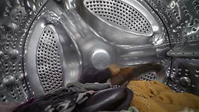 Washing dirty laundry inside the washingmachine