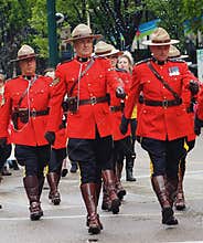 RCMP Officers Marching In KDays Parade In Edmonton Alberta