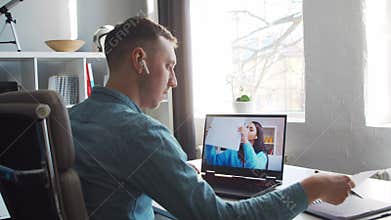 Colleagues have online call conversation via internet. Young entrepreneurs work at home offices and have conference call