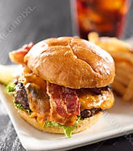 Cheeseburger meal with drink