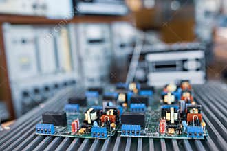 Close-up electric green embedded microcircuits in production