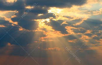 Sun rays and clouds
