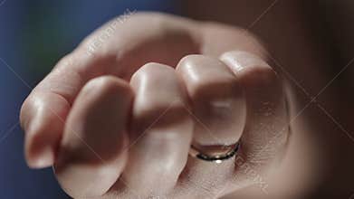 Key hidden in the hand