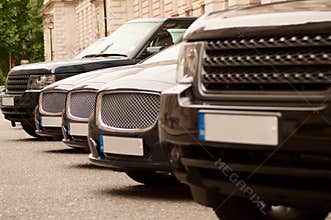 Luxury cars in a row