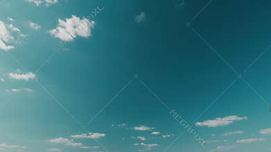 Beautiful Blue Sky With Clouds. Beautiful White Cumulus Clouds In Blue Sky With Sunlight.