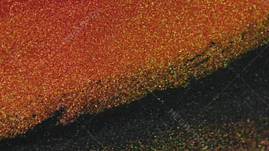 Glitter fluid texture ink spill red black paint