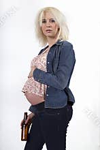 Young Pregnant Woman Having a Beer